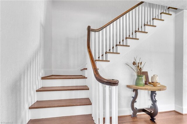 1501 Wiltshire St, High Point, NC 27265 - stairs with wood finished floors and baseboards