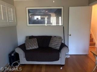 living room featuring dark hardwood / wood-style flooring