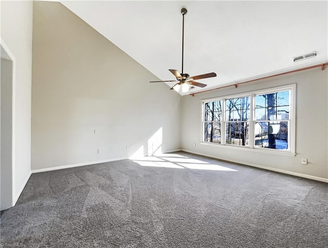 carpeted empty room featuring lofted ceiling and ceiling fan