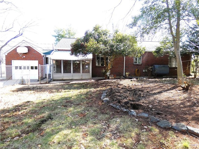 ranch-style house with brick siding