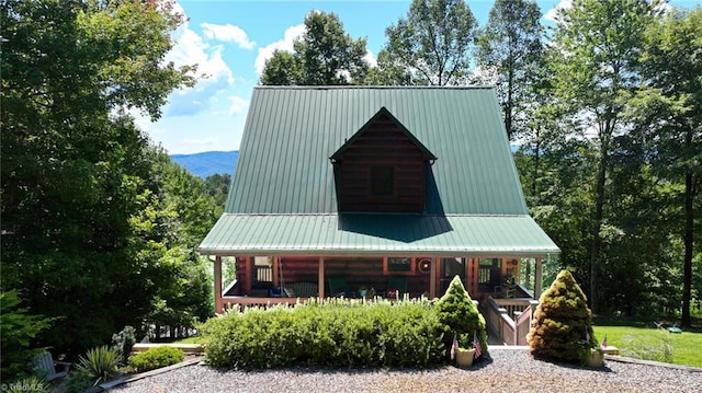 view of front of property featuring metal roof