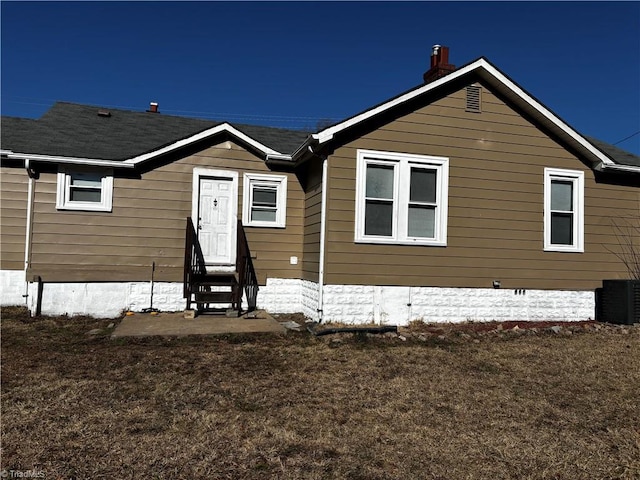 view of front of home featuring central AC unit