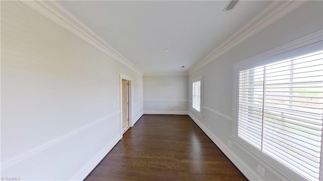 corridor with baseboards, visible vents, dark wood-style flooring, and ornamental molding