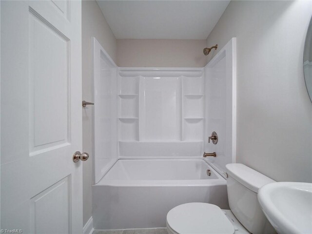 full bathroom with toilet, shower / washtub combination, and sink