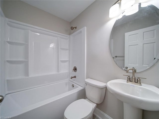 full bathroom with shower / bath combination, toilet, and sink