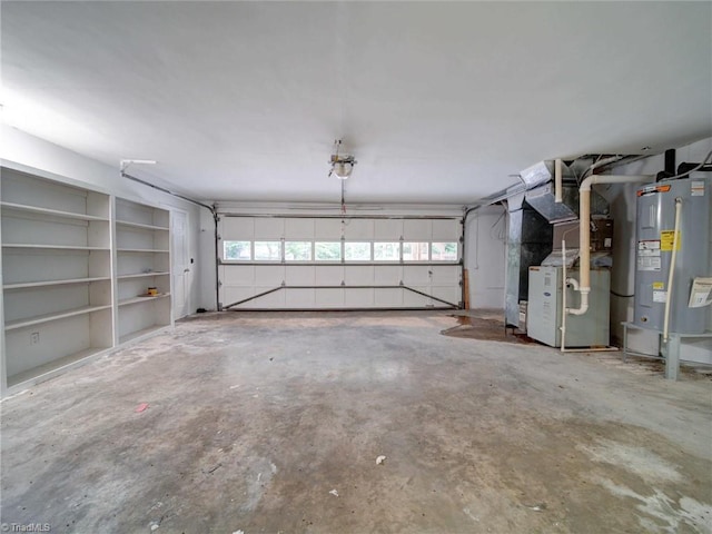 garage featuring heating unit, electric water heater, and a garage door opener