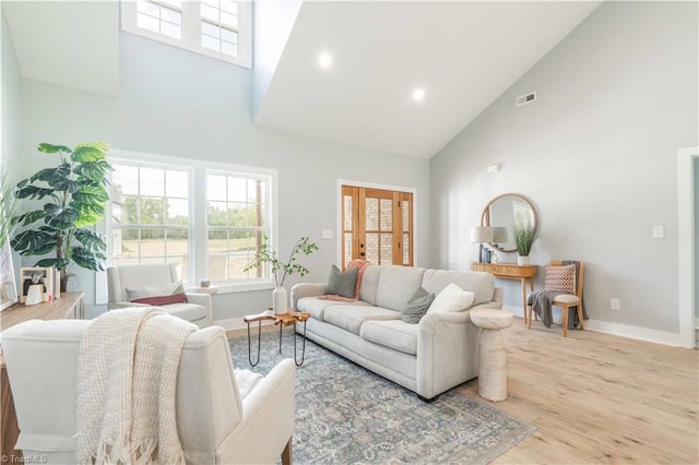 115 Corbin Ln, Lexington, NC 27295 - living area with high vaulted ceiling, healthy amount of natural light, wood finished floors, and recessed lighting