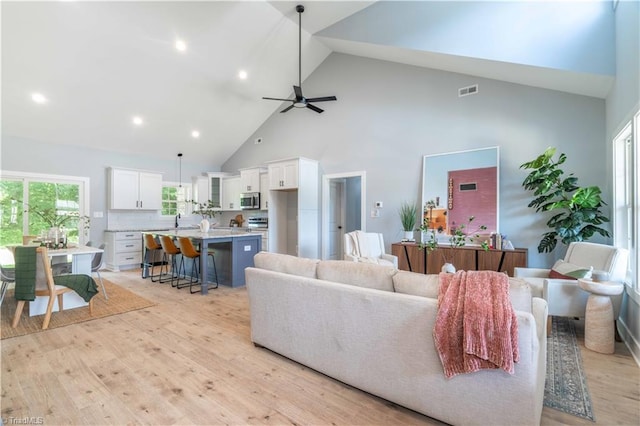 115 Corbin Ln, Lexington, NC 27295 - living room with high vaulted ceiling, light wood-type flooring, a ceiling fan, and recessed lighting