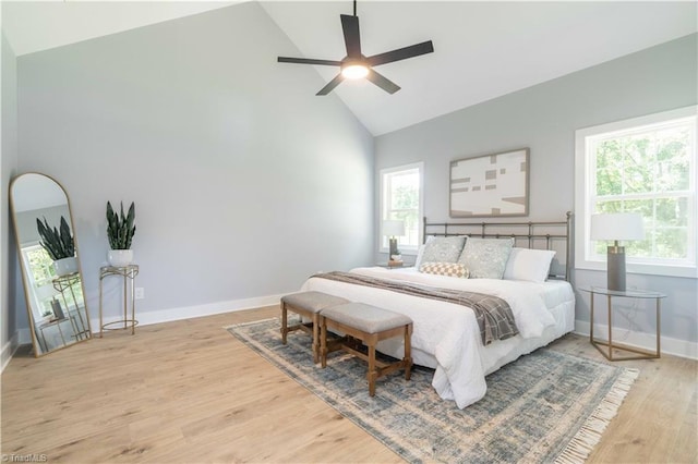 115 Corbin Ln, Lexington, NC 27295 - bedroom with high vaulted ceiling, light wood-style floors, multiple windows, and a ceiling fan