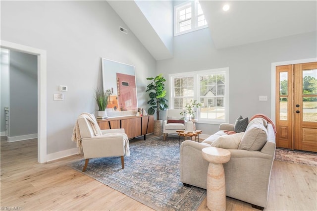115 Corbin Ln, Lexington, NC 27295 - living area with high vaulted ceiling, plenty of natural light, and wood finished floors