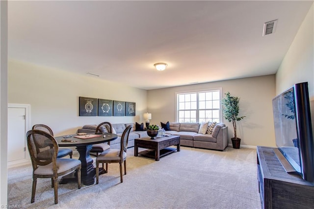 living room with light carpet