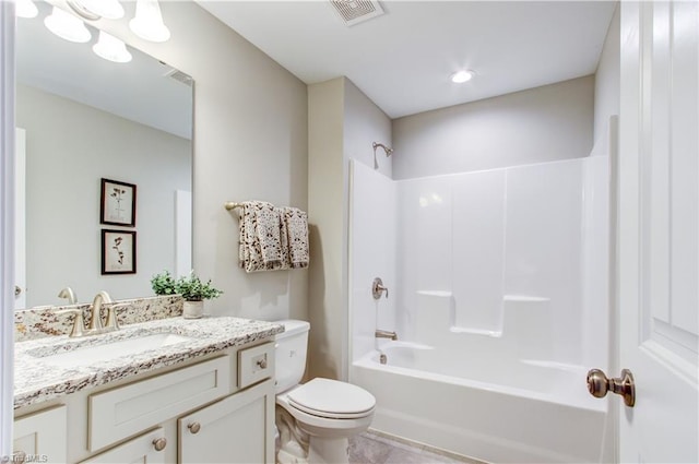 full bathroom with vanity, toilet, and bathtub / shower combination