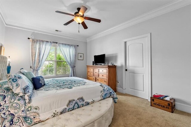 3615 Sainsbury Ln, Greensboro, NC 27409 - carpeted bedroom featuring ornamental molding and a ceiling fan