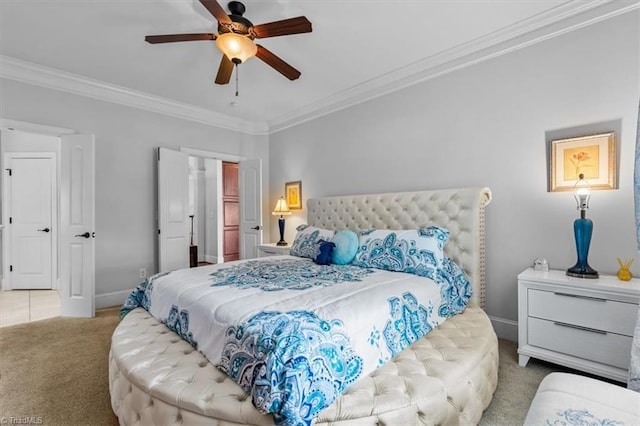 3615 Sainsbury Ln, Greensboro, NC 27409 - bedroom featuring crown molding, carpet flooring, a ceiling fan, and baseboards
