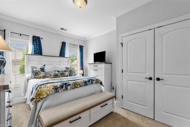 3615 Sainsbury Ln, Greensboro, NC 27409 - bedroom with light colored carpet, crown molding, and a closet