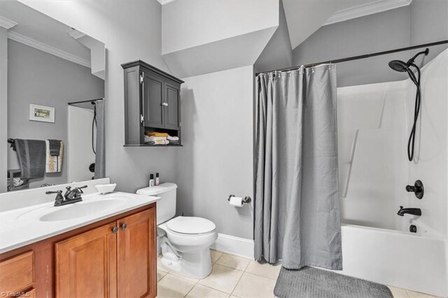3615 Sainsbury Ln, Greensboro, NC 27409 - bathroom featuring ornamental molding, tile patterned flooring, vanity, toilet, and shower / bath combo