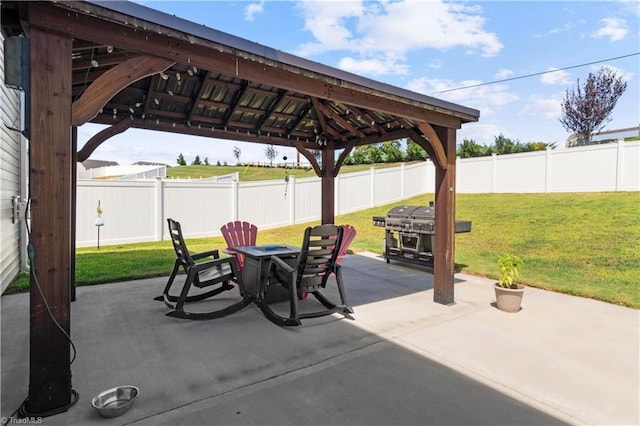 view of patio / terrace featuring a gazebo, a fenced backyard, and area for grilling