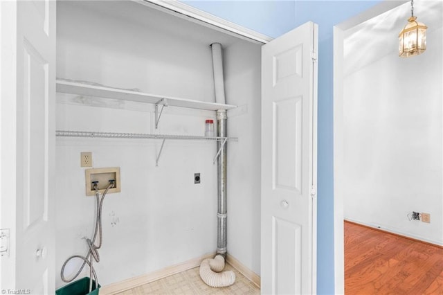 laundry area with washer hookup, electric dryer hookup, and hardwood / wood-style floors