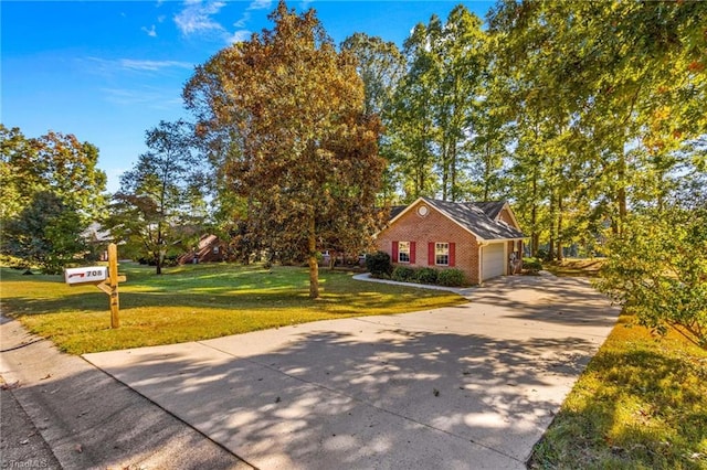 view of front facade featuring a garage and a front yard