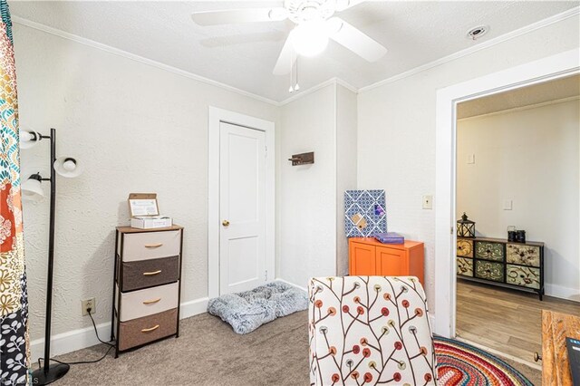 1602 Larkin St, High Point, NC 27262 - living area with ornamental molding, baseboards, and a ceiling fan