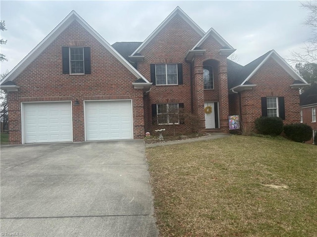 traditional home with a garage, brick siding, driveway, and a front lawn