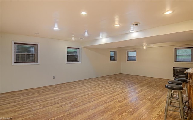 interior space featuring recessed lighting, visible vents, light wood-style flooring, and plenty of natural light