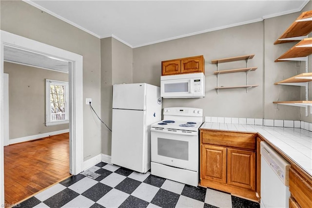 kitchen featuring white appliances, tile counters, dark floors, and open shelves