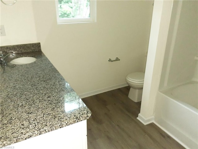 805 Granby Ave, High Point, NC 27260 - full bathroom featuring vanity, wood finished floors, and  shower combination