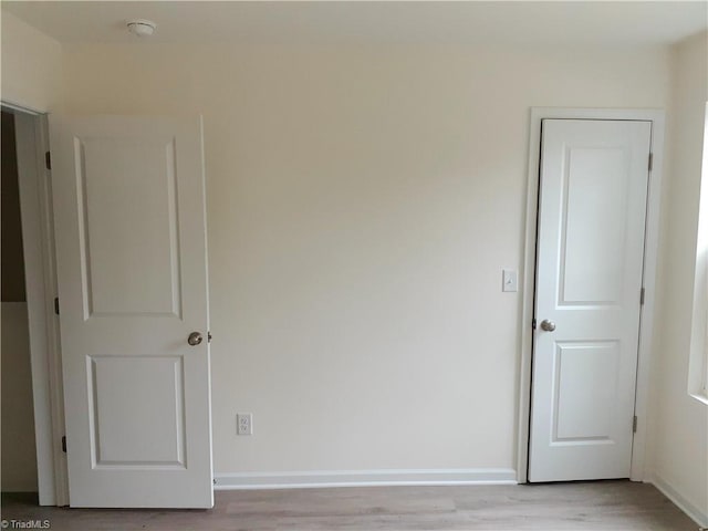 805 Granby Ave, High Point, NC 27260 - unfurnished room featuring light wood finished floors and a smoke detector