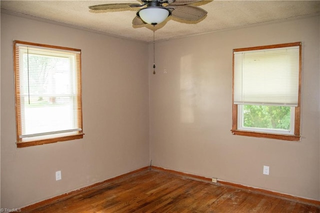 2446 Greenway St, Burlington, NC 27217 - unfurnished room featuring crown molding, wood finished floors, ceiling fan, and a textured ceiling