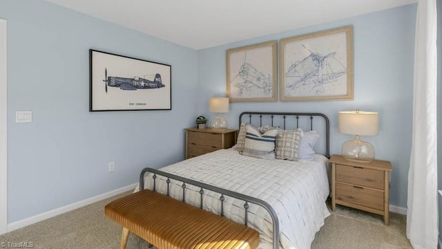 bedroom featuring light colored carpet