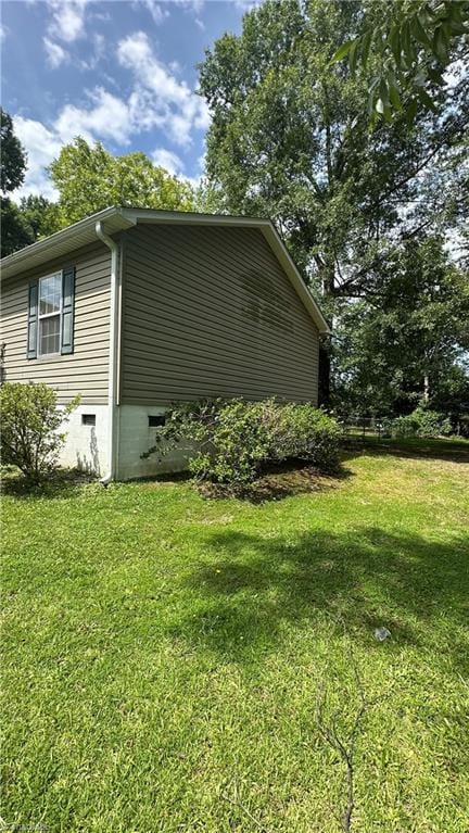 112 White St, Thomasville, NC 27360 - view of home's exterior with a lawn and crawl space