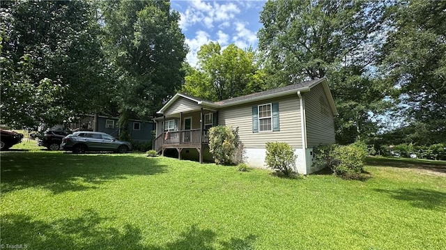 112 White St, Thomasville, NC 27360 - ranch-style home featuring a porch and a front lawn