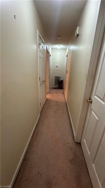 112 White St, Thomasville, NC 27360 - hall featuring light colored carpet and a textured ceiling