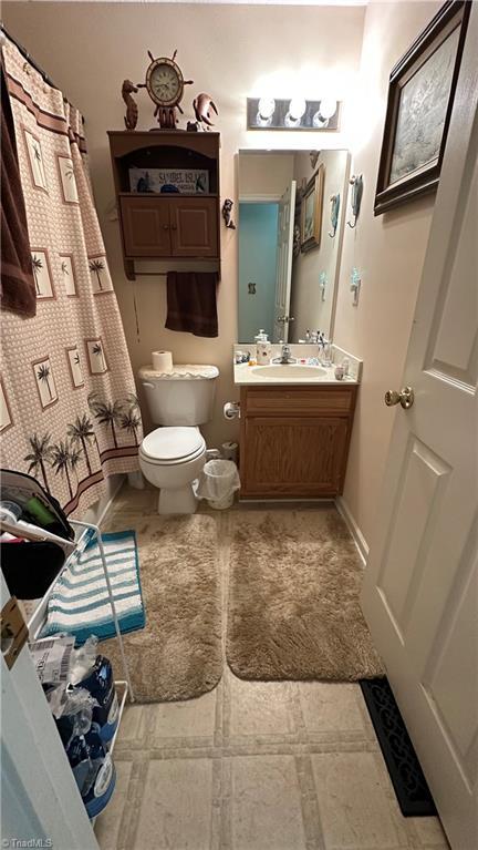 112 White St, Thomasville, NC 27360 - bathroom featuring vanity and toilet