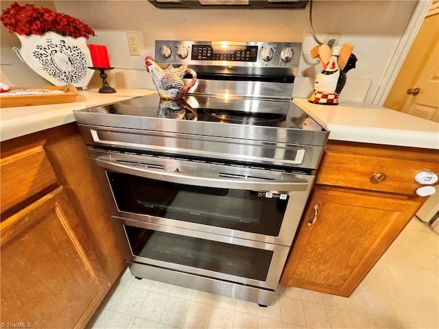 interior details with range with two ovens