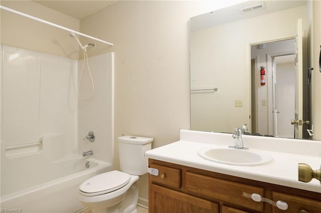 full bathroom with shower / bathing tub combination, vanity, and toilet