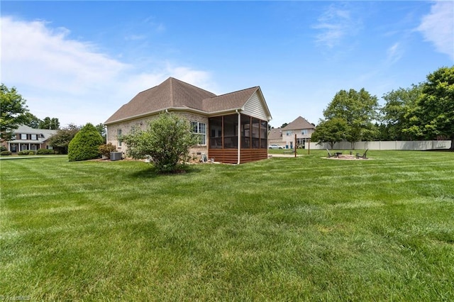7796 Crabtree Valley Ct, Greensboro, NC 27455 - view of yard with a sunroom and central AC unit