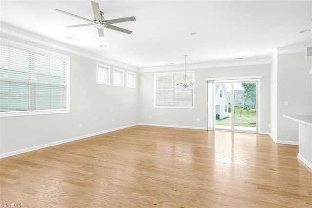 unfurnished living room with ceiling fan with notable chandelier, light hardwood / wood-style flooring, and ornamental molding