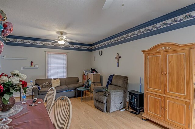 1401 Bretton St, Winston-Salem, NC 27105 - living area featuring ceiling fan and light wood-style floors