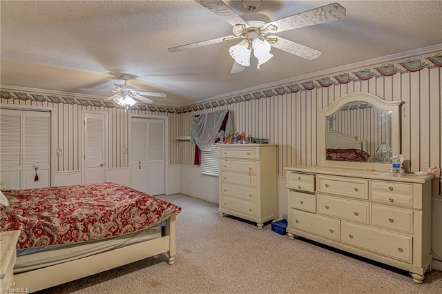 1401 Bretton St, Winston-Salem, NC 27105 - bedroom featuring crown molding, a textured ceiling, wallpapered walls, light colored carpet, and ceiling fan