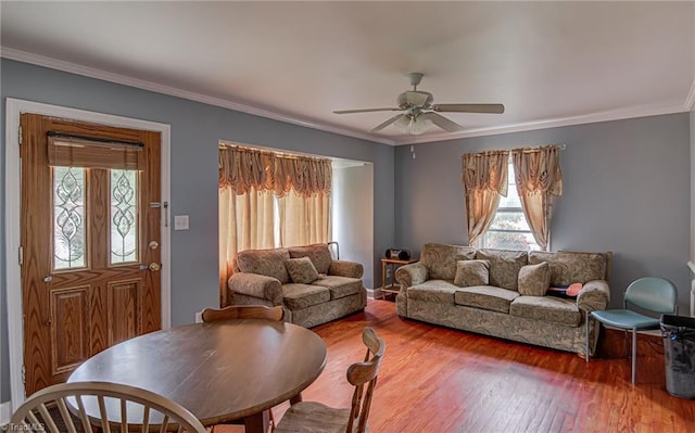 1401 Bretton St, Winston-Salem, NC 27105 - living area featuring plenty of natural light, ornamental molding, a ceiling fan, and wood finished floors
