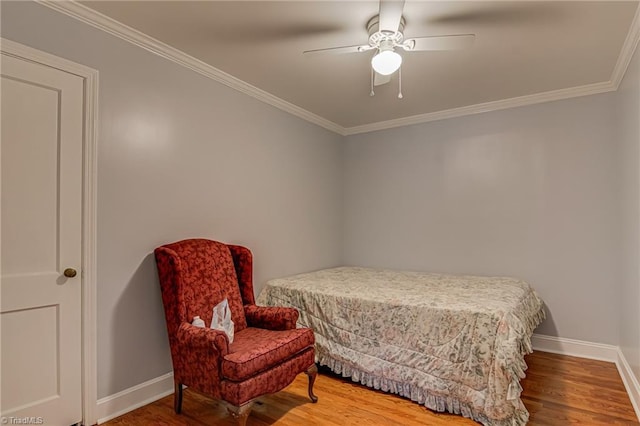 1401 Bretton St, Winston-Salem, NC 27105 - bedroom with wood finished floors, baseboards, ornamental molding, and ceiling fan