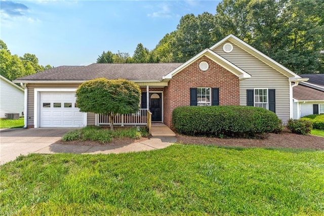 125 Haven Grove Trl, Clemmons, NC 27012 - ranch-style house featuring concrete driveway, a garage, a front yard, brick siding, and covered porch