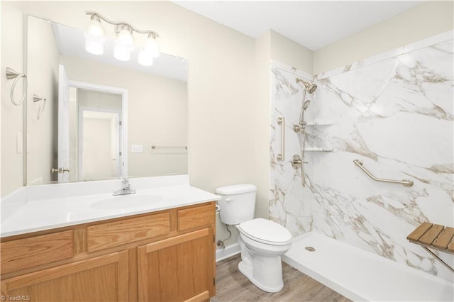 125 Haven Grove Trl, Clemmons, NC 27012 - full bath with vanity, a marble finish shower, and wood finished floors