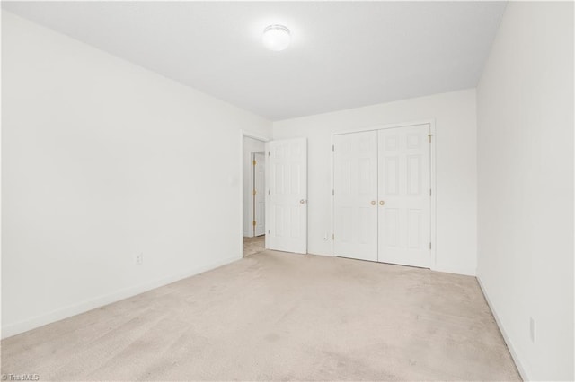 125 Haven Grove Trl, Clemmons, NC 27012 - unfurnished bedroom featuring carpet flooring and a closet