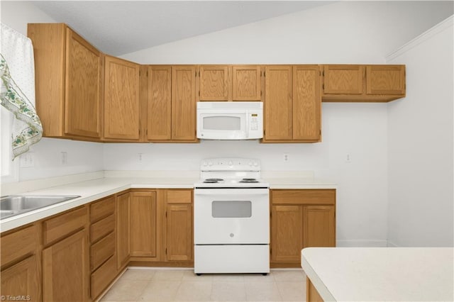 125 Haven Grove Trl, Clemmons, NC 27012 - kitchen with white appliances, vaulted ceiling, light countertops, and brown cabinetry