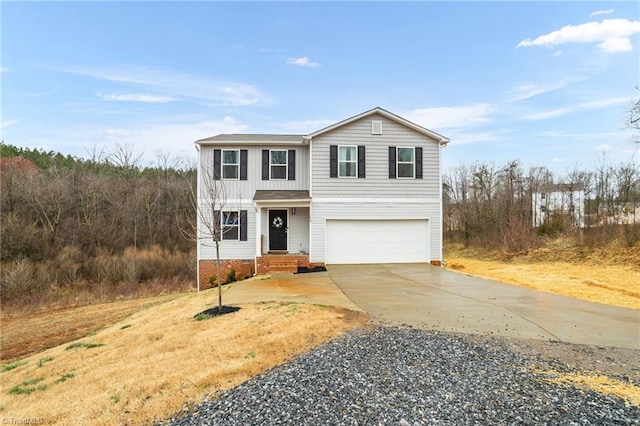 traditional home with driveway and an attached garage