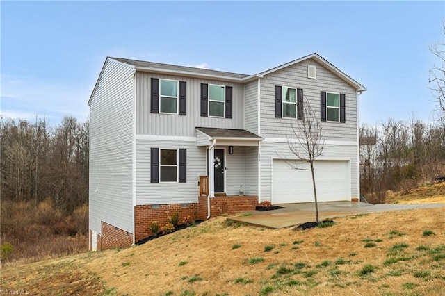 traditional-style home featuring board and batten siding, crawl space, concrete driveway, and an attached garage