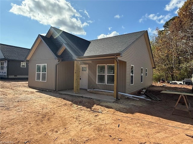 view of front of property featuring a patio